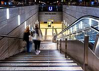 Night photo, long exposure with motion blur, modern underground entrance at Unter den Linden station, contemporary design with stairs and escalator, Berlin, Germany [IBR112672580]