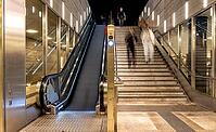 Night photo, long exposure with motion blur, modern underground entrance at Unter den Linden station, contemporary design with stairs and escalator, Berlin, Germany [IBR112672585]