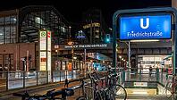 Night photo, long exposure at Friedrichstraße S-Bahn and metro station, in the centre runs the tram line M 12, Berlin, Germany [IBR112672617]