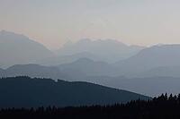 View from Austria to the Berchtesgaden Alps with Hohem Göll, Watzmann, Hochkalter and Untersberg in hazy evening light, Upper Bavaria, Bavaria, Germany [IBR123435194]