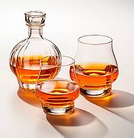 Alcohol in a decanter and glasses on a white background, AI generated [IBR123435203]