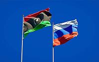 Beautiful national state flags of Libya and Russia together at the sky background. 3D artwork concept [IBR123569270]