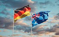 Beautiful national state flags of Germany and Australia together at the sky background. 3D artwork concept [IBR123569282]