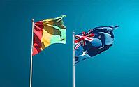 Beautiful national state flags of Guinea and Australia together at the sky background. 3D artwork concept [IBR123569291]