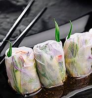 Food, Vietnamese spring rolls on black plate [IBR123622452]