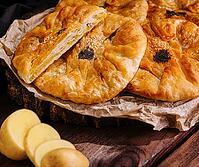 Food, Cooking traditional pies with potato on wooden board [IBR123622500]