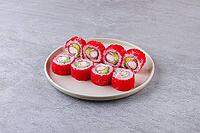 Food, Shrimp tempura and avocado inside-out roll coated in bright red tobiko, served on a stone surface with a beige plate [IBR123622505]