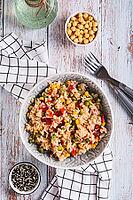 A bowl of cooked rice and vegetables for garnish on the table top and vertical view [IBR123629721]
