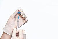 Doctor hand holf medicine vaccine. Anti virus health treatment. Medical nurse surgical. Pharmacy laboratory. Reseach center. Covid concept. Safety anaesthetist procedure. White background [IBR123629779]