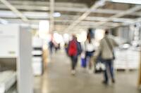 Blurry people at shop store. Defocused mall interior bakground. Crowd business retail market. Franchise backdrop. Copyspace. Exhibition view [IBR123629780]