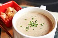 Creamy onion soup with green. Health food at cafe. Classic cuisine. Cooking bowl with bread croutons. Yam dish. Hot vegetable plate [IBR123629781]