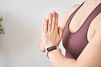 Young woman going yoga exercise at home. Relax meditation. Health care online lessons. Indoor fitness workout. Remote sport trainer. Morning activity. Floor pilates mat. Female person lifestyle. Asana [IBR123638346]