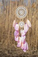 Dream catcher with feathers threads and beads rope hanging. Dreamcatcher handmade [IBR123639531]