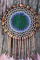 Dream catcher with feathers threads and beads rope hanging. Dreamcatcher handmade [IBR123639539]
