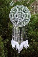 Dream catcher with feathers threads and beads rope hanging. Dreamcatcher handmade [IBR123639546]