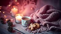 A warm scene features a soft wool scarf nestled next to a cup of cocoa, cookies, and flickering candles on a rustic wood table. Pinecones add a touch of nature to the cozy atmosphere. AI generated [IBR123641885]