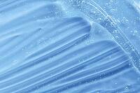 Transparent beauty korean cosmetic serum. Hand sanitizer gel texture smear smudge swatch with bubble. Blue moisturizing cleanser hair gel sample. Skincare makeup cream. Skin care liquid splash product [IBR123646463]