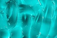Abstract cosmetic background. Blue gel texture smear with bubble. Transparent beauty serum cosmetic product. Skincare makeup cleanser smudge swatch. Moisturizing cream, hair gel. Macro, closeup [IBR123646471]