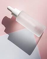 Hyaluronic acid oil tincture, mockup, branding. Serum with collagen and peptides. Liquid emulsion in bottle with dropper. Concept bio organic beauty product with natural extract. Flat lay, top view [IBR123646494]