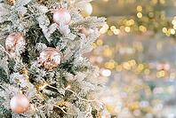 Christmas tree decorated with golden balls on defocused blurred, sparkling, magic background. Merry christmas card. New Year decoration on bokeh backdrop. Copy space [IBR123646515]