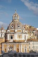 Rome, Italy - 09.12.2022: Chiesa di Santa Maria di Loreto. Historic architecture of Rome: majestic dome and traditional buildings against blue sky [IBR123646524]