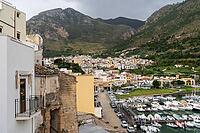 Castellammare del Golfo, Italy - 05.11.2022: Picturesque coastal town with marina and mountain views [IBR123646545]