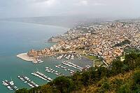 Castellammare del Golfo, Italy - 05.11.2022: Scenic coastal town with harbor and mediterranean sea view, Castello Arabo Normanno aerial view [IBR123646552]