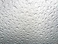 Abstract texture of water drops on a glass [IBR123646558]