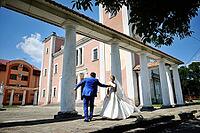 Just married couple near old columns [IBR123675093]