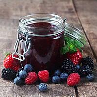 A Jar Of Mixed Berry Jam On A Wooden Background [IBR123700030]