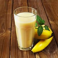 A Glass Of Banana Juices On A Wooden Background [IBR123700031]