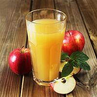 A Glass Of Apple Juice On A Wooden Background [IBR123700032]