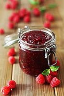 A Jar Of Raspberry Jam On Wooden Background [IBR123700036]