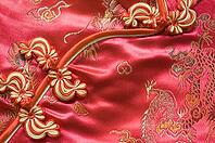 Traditional Chinese Red knot buttons on silk dress with beautiful patterns [IBR123713341]