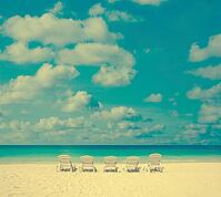 Concept photo of beach with chair in vintage toned [IBR123713351]