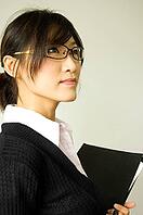 Young women holding a file [IBR123713358]