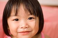 Little asian girl with smiling face [IBR123713369]