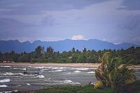 Fisherman returning to the beach after days work on a rough seas on the coast of Sumatra Island, Indonesia, Asia [IBR123713381]