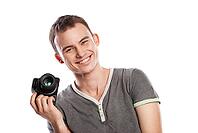 Portrait of male photographer with camera isolated on white background [IBR123723155]