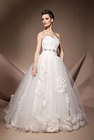 The beautiful young woman posing in a wedding dress [IBR123723171]