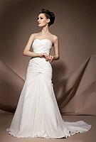 The beautiful young woman posing in a wedding dress [IBR123723177]