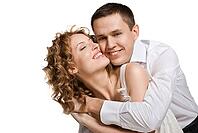 Portrait of a beautiful young happy smiling couple - isolated [IBR123723178]