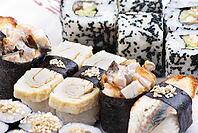 Traditional Japanese food Sushi. Closeup japanese sushi on a white plate. Sushi set [IBR123723207]