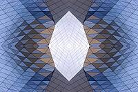 Abstract photography with a symmetrical, crystalline form, consisting of intertwined diamond-shaped surfaces in shades of blue, gray and subtle brown, which create a sense of depth, structure and cool architectural dynamism [IBR123760833]