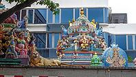 Colourful temple roof with figures and a lion, Singapore, Singapore [IBR123769646]