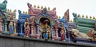 Detailed figures in bright colors on temple roof, Singapore, Singapore [IBR123769647]