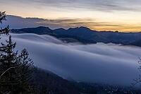 Fog flow, high fog flows over Unteren Hauenstein Pass into the Basel area, long exposure, Wisenberg, Baselland, Switzerland [IBR123769696]