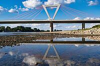 Airport bridge of the A44, cable-stayed bridge, reflection, motorway bridge across the Rhine near Meerbusch Düsseldorf, North Rhine-Westphalia, Germany [IBR123769701]