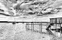 Sailboat, boat dock, Lake Ammer, Voralpensee, tourism, local recreation, vacation, greater Munich area, black and white photo, Upper Bavaria, Bavaria, Germany [IBR123774743]