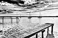 Sailboat, boat dock, Lake Ammer, Voralpensee, tourism, local recreation, vacation, greater Munich area, black and white photo, Upper Bavaria, Bavaria, Germany [IBR123774748]